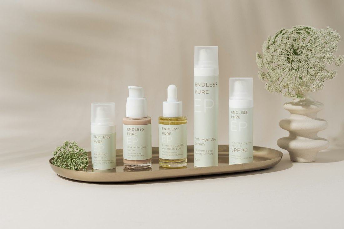 Minimal skincare bottles on a tray